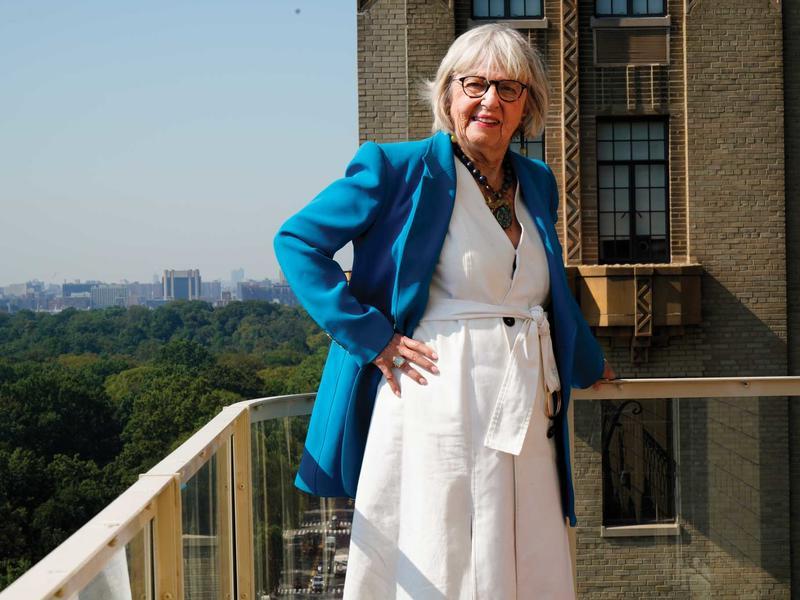 Harriet Newman Cohen standing on a balcony